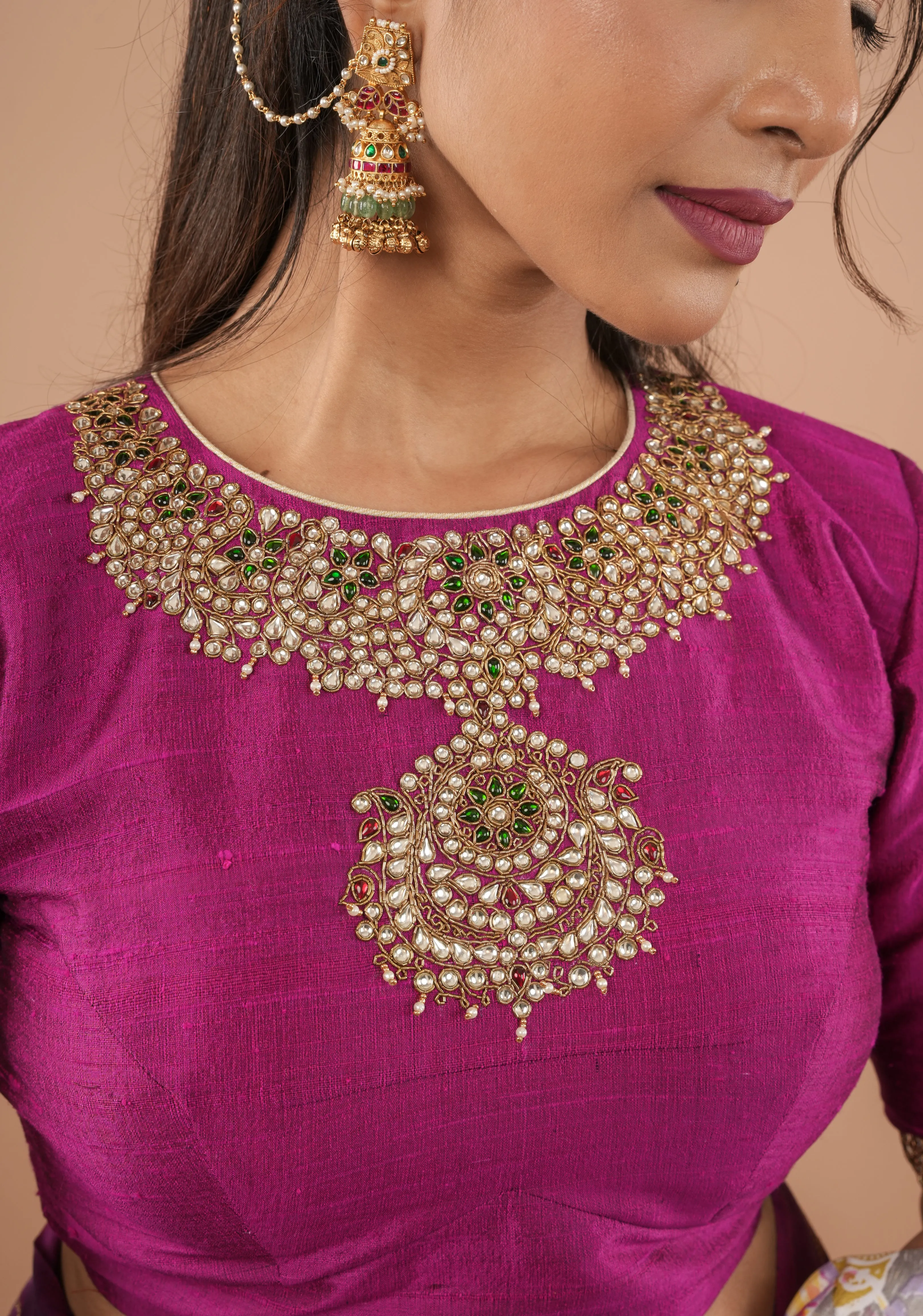 Fuchsia pure raw silk blouse with Kundan necklace and bajuband handwork and unique back cutout | Made to Order